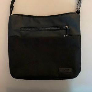 Travelon cross body bag like new.